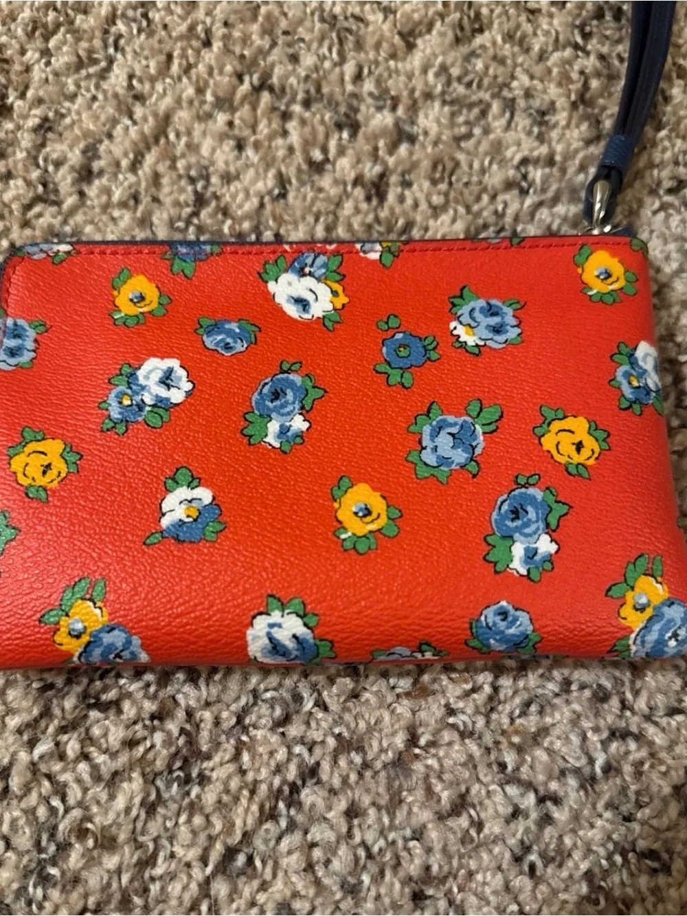 Coach Red Floral Wristlet with wolf Patch